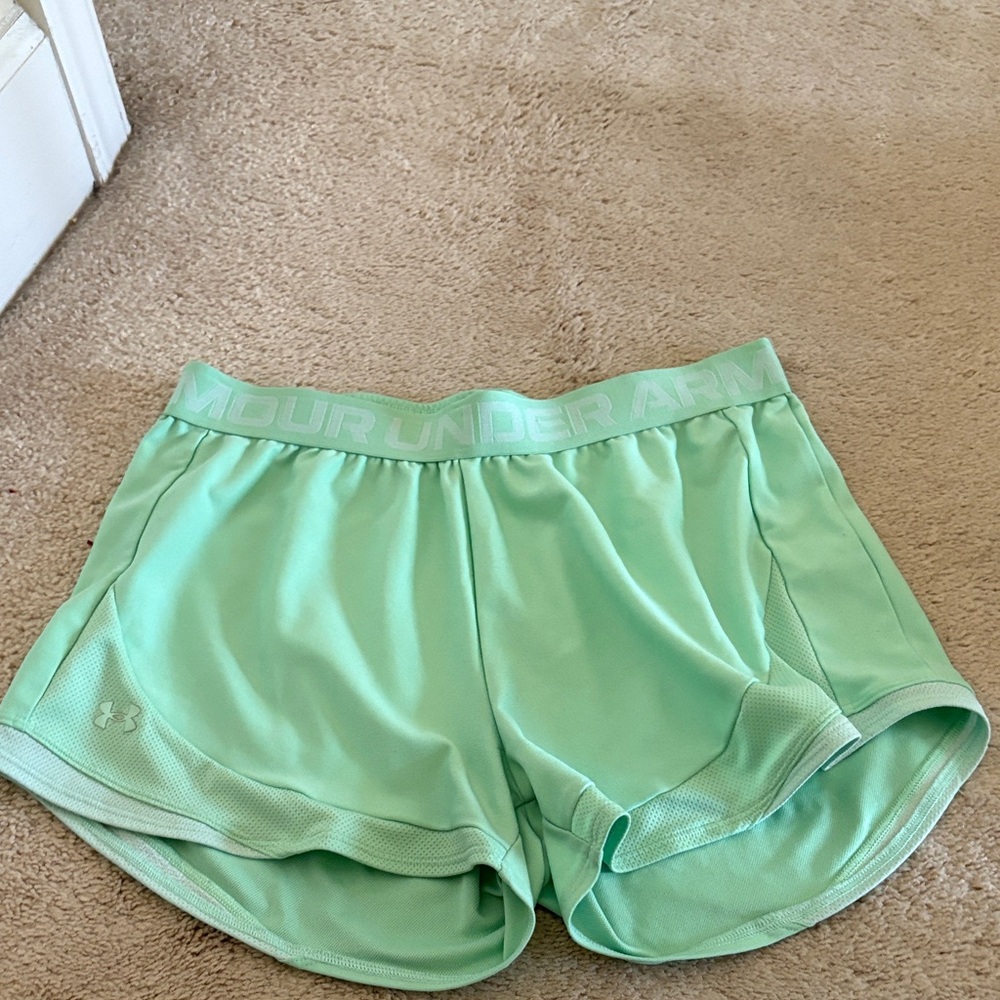 Women’s green Under Armour shorts.